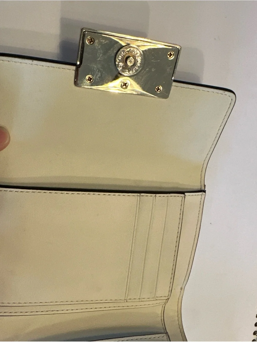 Kate Spade New York Reegan Pansy cream wallet with purple and yellow floral